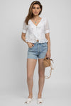 FRAME Ruffle Front Short Sleeve Top in Blanc
