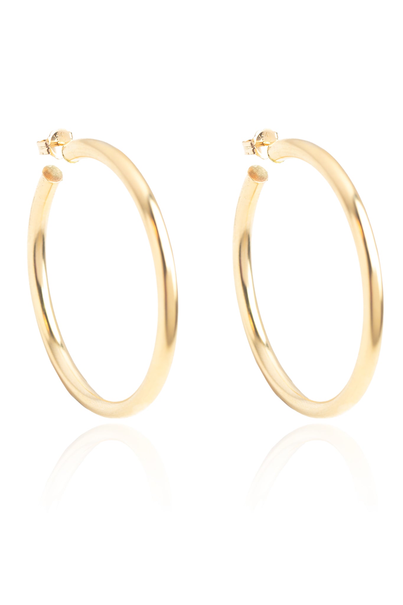 L.A. STEIN Large Chunky Hollow Hoop Earrings in Yellow Gold